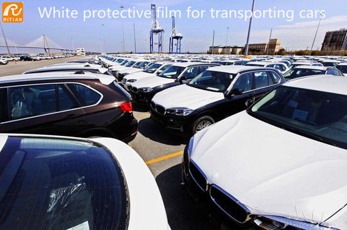 Het laatste nieuws van het bedrijf over Witte auto die beschermende film voor het vervoeren van auto's schilderen